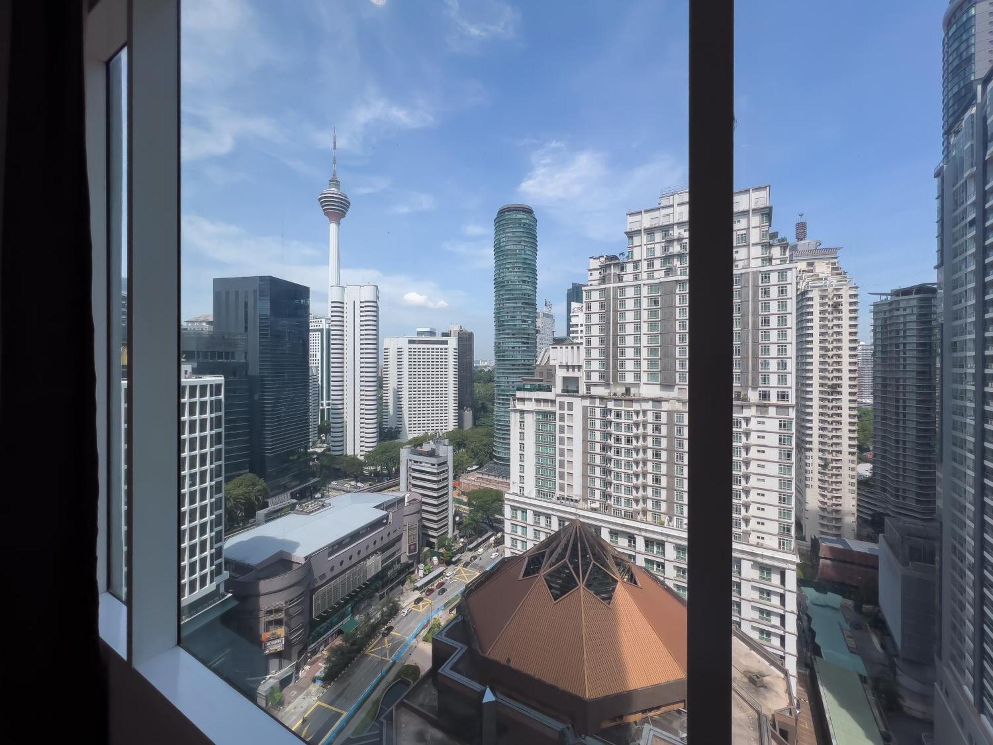 Soho Suites Klcc By Guesthouse Куала Лумпур Екстериор снимка